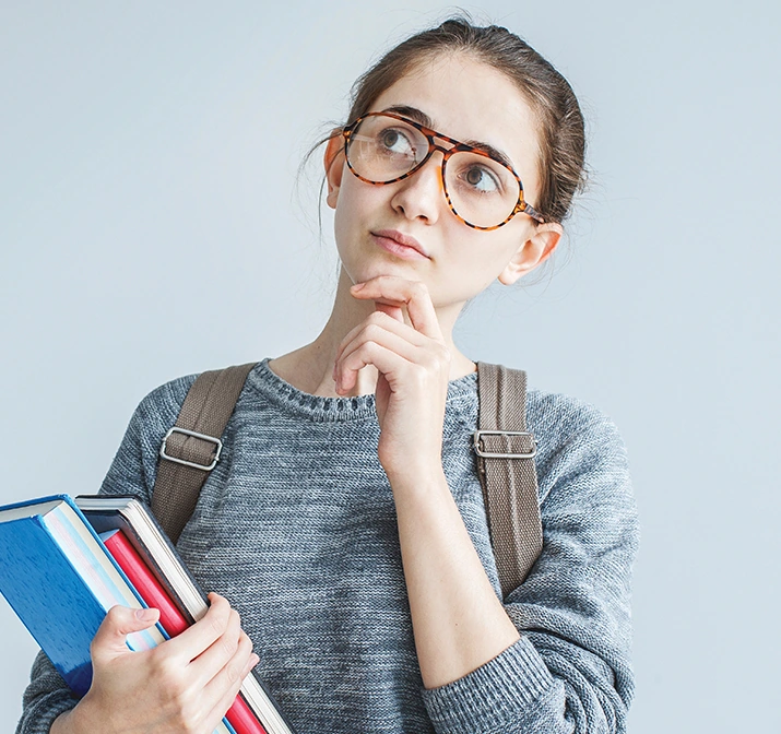 Prospective college student holding books